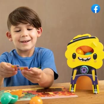 A boy beside a yellow MEandMine character model