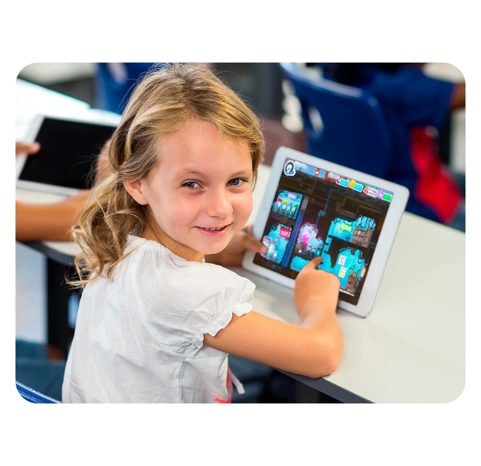 A girl playing MEandMine on a tablet in class