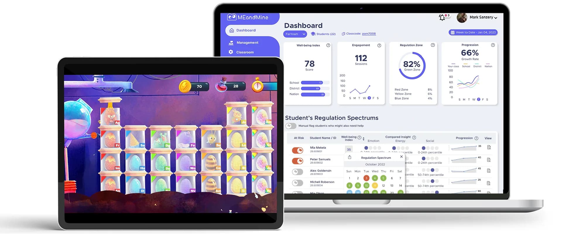 The MEandMine game on a tablet beside the educator dashboard on a laptop