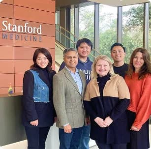 The MEandMine team with researchers at Stanford Medicine