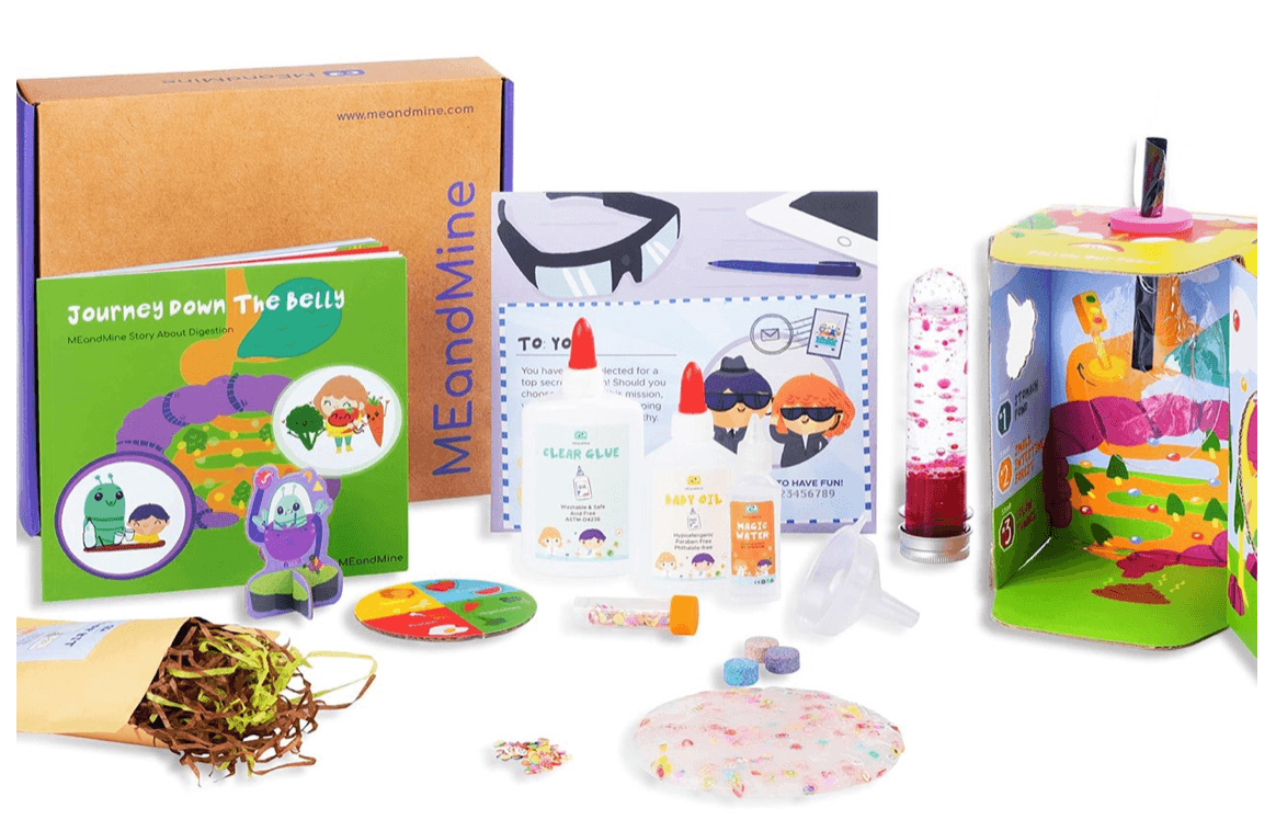 MEandMine Journey Down the Belly kit: storybook, slime-making bottles, a test tube and a cardboard digestion model.